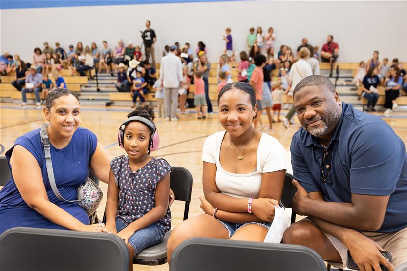 Students cut ribbon at new school